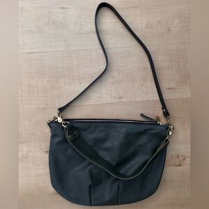 Brand New Moyen Messenger in perfect condition dark green leather